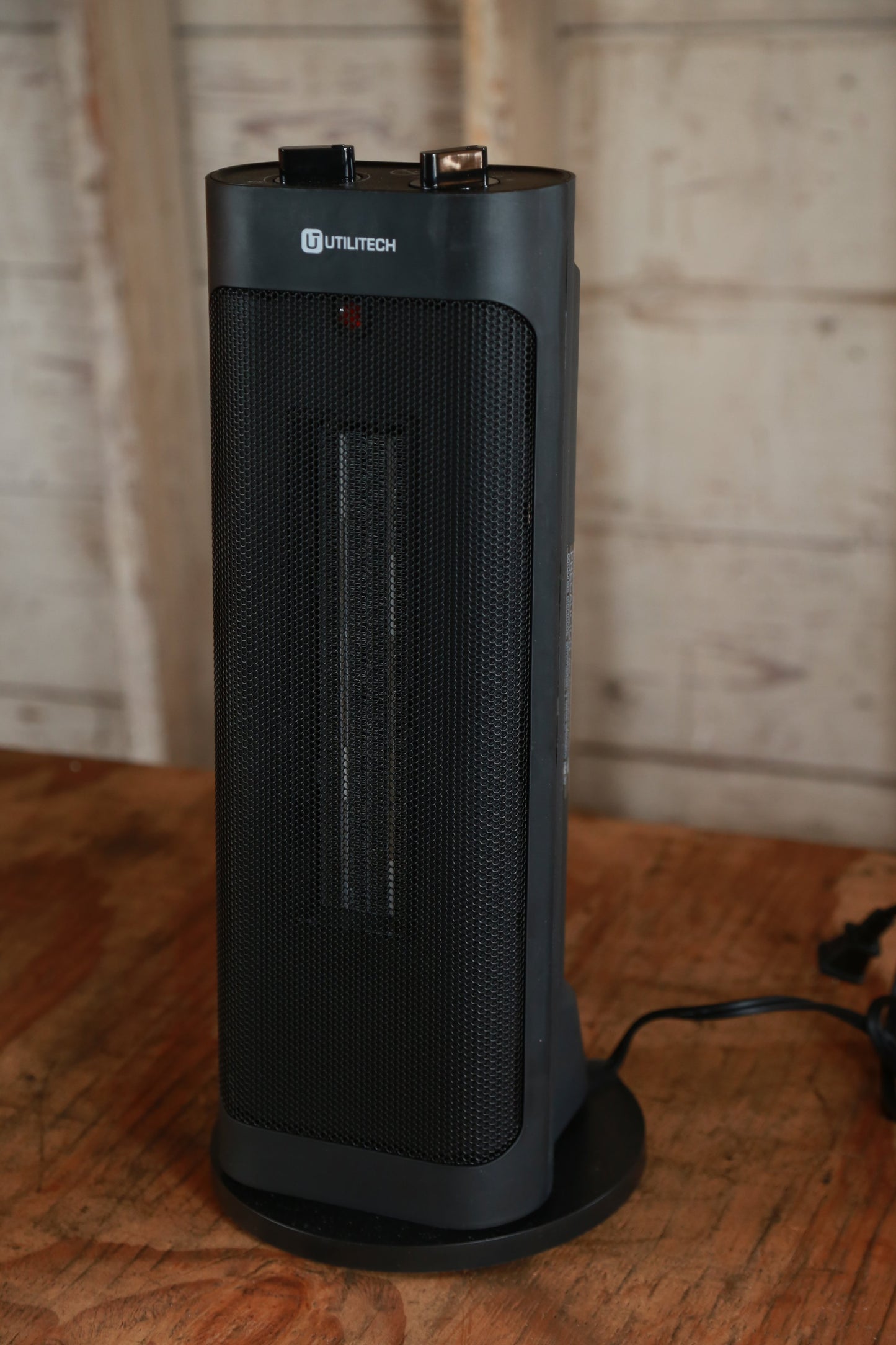 Utilitech 1500-Watt Ceramic Tower Indoor Electric Space Heater with Thermostat